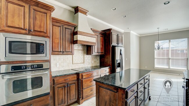 Building Photo - Versatile Deer Creek Corner-Lot Home | 3 Bedrooms, 3.5 Baths + 2 Flex Rooms for Offices, Studies,...