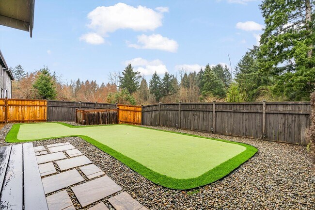 Building Photo - Backyard Putting Green + Outdoor Fireplace | Comfortable Puyallup Rental