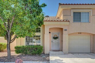 Building Photo - 2 Bedroom Condo w/ Patio & 1 Car Attached ...
