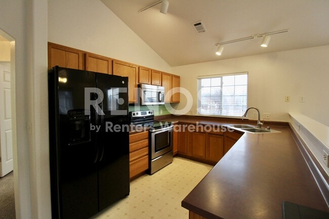 Building Photo - 3242 E 103rd Dr