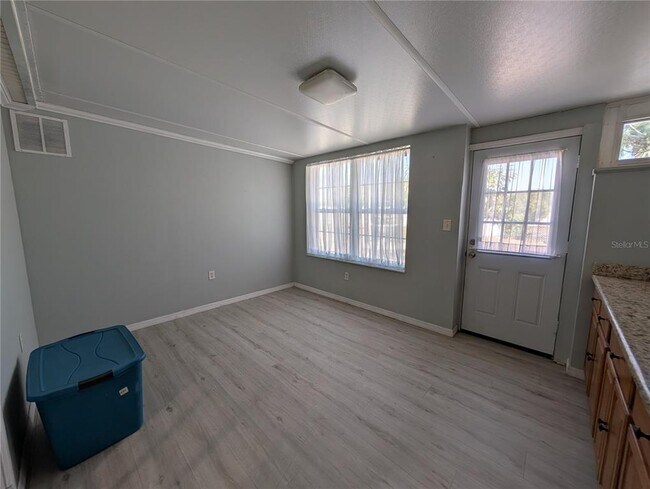 Building Photo - 6947 Bottle Brush Dr