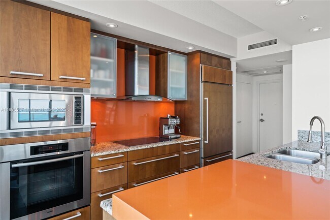 Building Photo - 3801 Collins Ave
