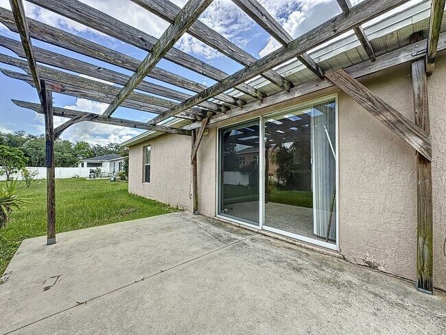Building Photo - Poinciana single family home in Village 7,...
