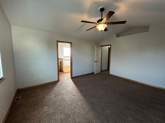 Building Photo - Spacious 5-Bedroom Home with Finished Basement and 3-Car Garage in Wellington