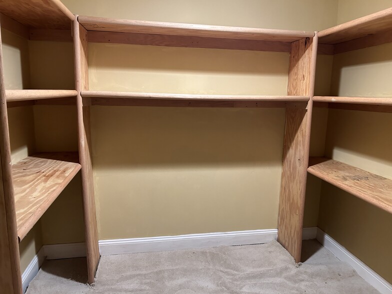 Large storage room with built in shelves - 9809 Hammer Ln