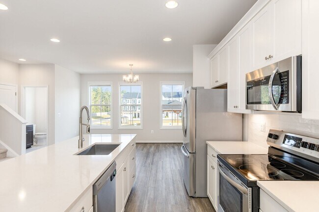 Building Photo - New Price – Move-In Ready 4BR / 4BA Townho...