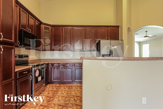 Building Photo - 14135 W Riviera Dr