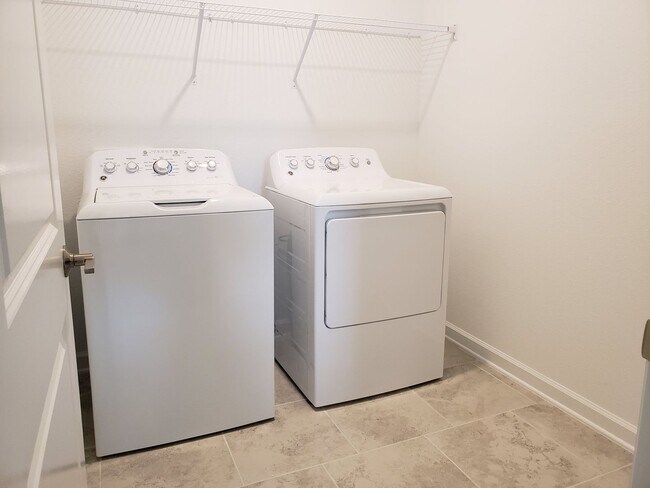 Building Photo - Bridgewalk Corner Lot Home with Wooded View and Solar Panels