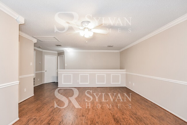 Building Photo - The living is easy in this gorgeous 4BR, 2.5BA brick home