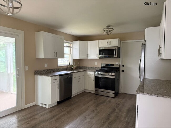 Building Photo - Newly Renovated - Spacious 4 Bedroom - 2 B...