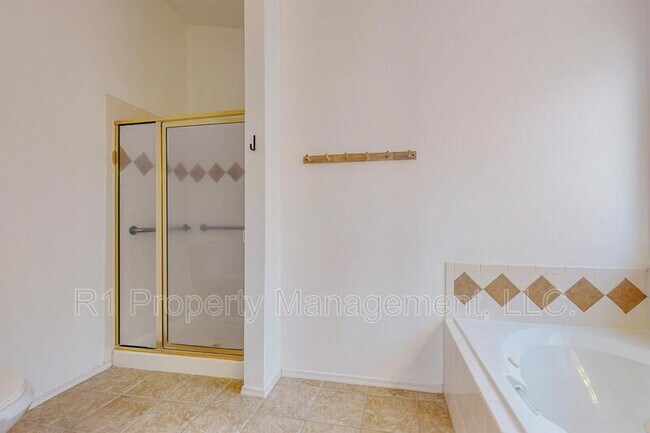 Building Photo - 5551 Rabadi Castle Ave NW