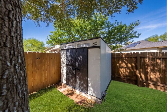 Building Photo - Where Game Nights, Backyard Gatherings, and Quiet Evenings Come Together