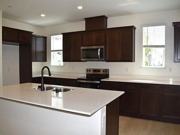 Building Photo - Located in one of Elk Grove's most sought-after neighborhoods
