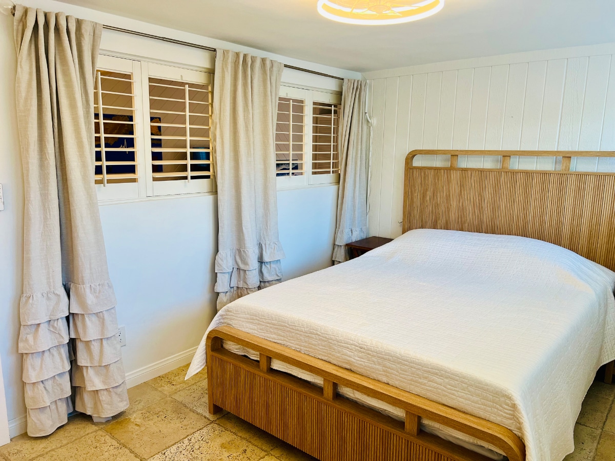 Guest bedroom has windows and louvers/drapes on interior side - 24 Westwind St
