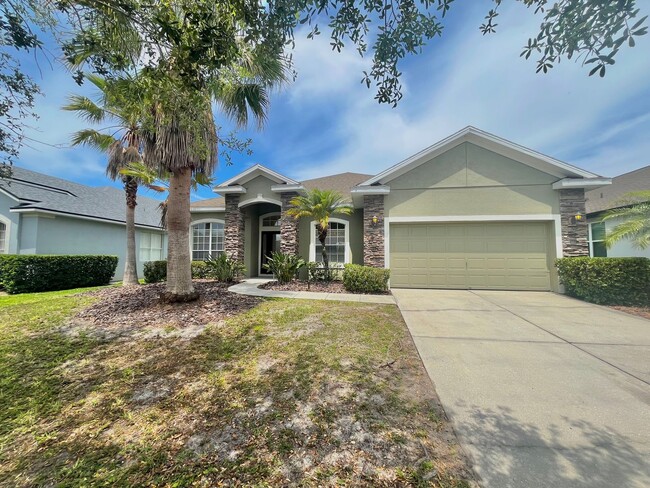 Building Photo - Spacious 4-Bed, 3-Bath Home in Guard-Gated...