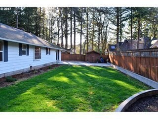 Building Photo - Quiet and Private Set in Forested Neighbor...