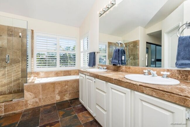 Building Photo - Look no further than this Gorgeous 5 bedroom home in Carlsbad with views for miles.