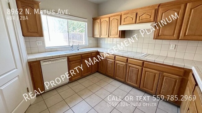 Building Photo - 8962 N Matus Ave