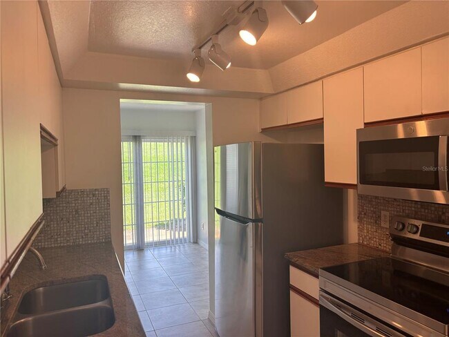 Building Photo - 4813 Coachmans Dr