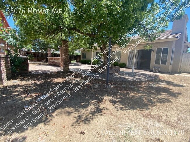 Building Photo - 35076 Momat Ave