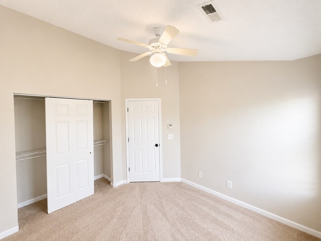 Building Photo - Beautiful 3-Bedroom Townhome with Pond View | Lawn Care Included | Convenient Whitsett Location