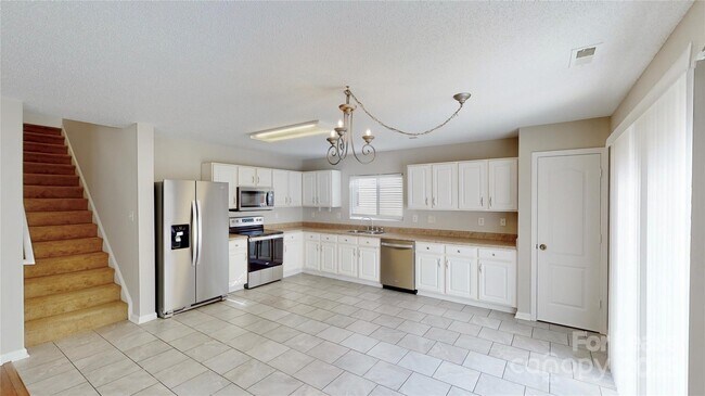 Building Photo - 8139 Deodora Cedar Ln