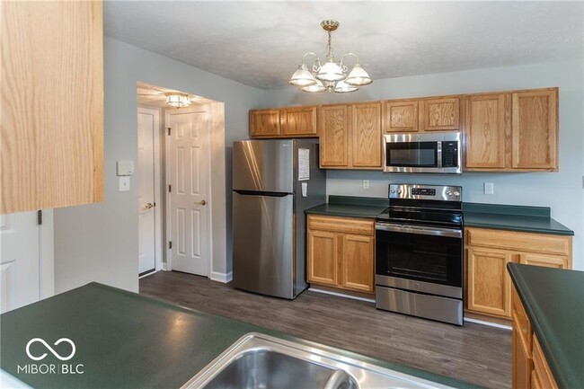 Building Photo - 9361 Eden Woods Ct