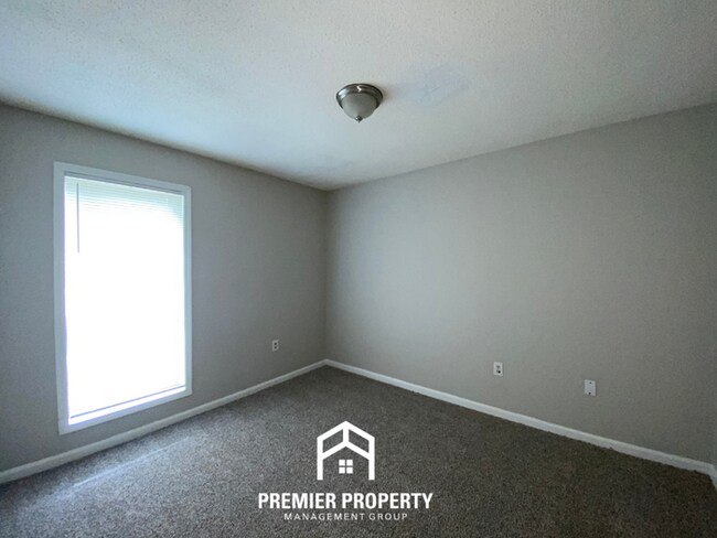 Building Photo - Millington Charm | 3BR/2BA with High Vaulted Ceilings & Rustic Fireplace