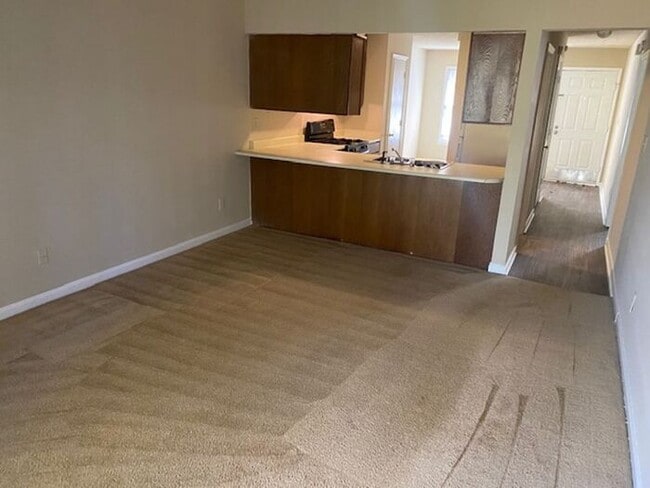 Building Photo - NOW AVAILABLE! Charming 2-Bedroom, 2-Bathroom Single-Level Townhome