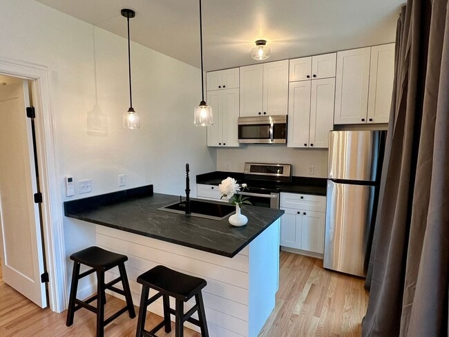 Building Photo - Private and Stylish One-Bedroom, Available...