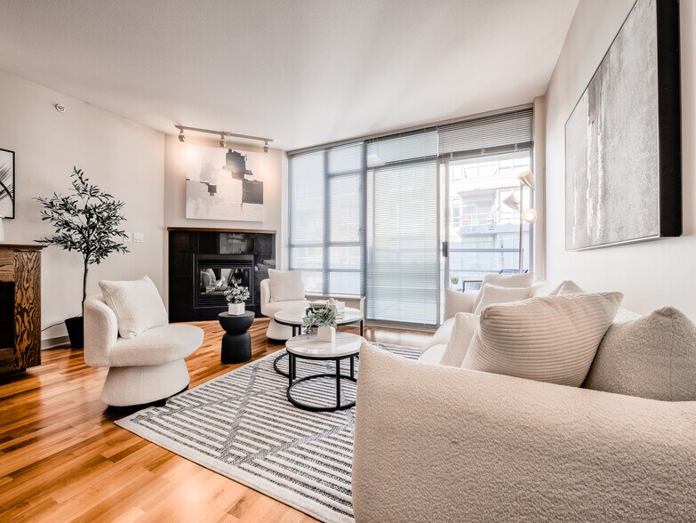 Sophisticated urban living with an elegant gas fireplace and high-efficiency Central A/C - 2929 1st Ave