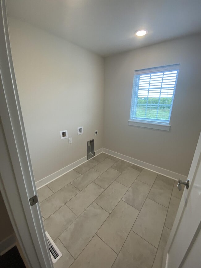 Building Photo - N161W21877 Daisy Dr
