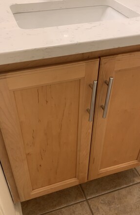 Tall wood vanity for towels and toiletries - 535 W Glenn Ave