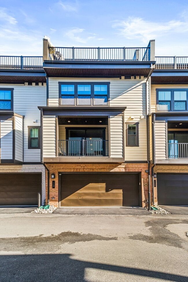 Building Photo - Your new home awaits you! Luxury Townhouse...