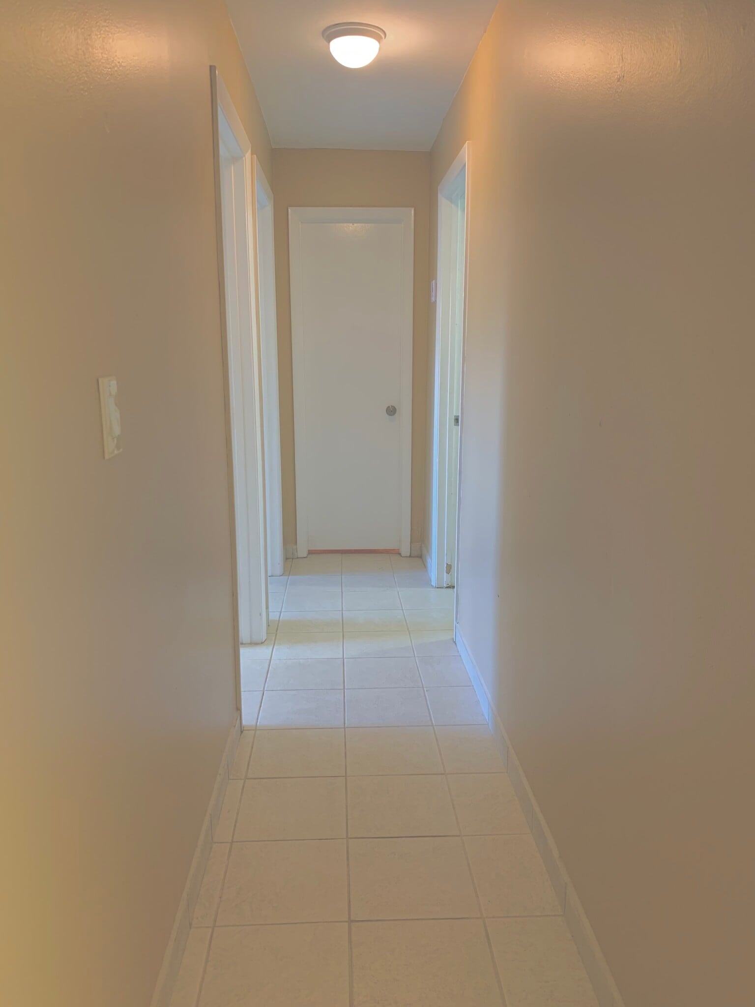 Access Hallway to the Second, Third Bedrooms, Second Bathroom, and Laundry Room Area. - 13566 SW 11th Ln