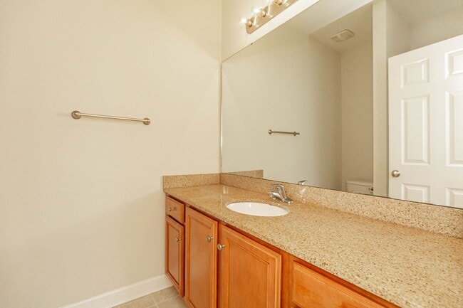 Building Photo - Located just Steps from Shopping, Dining, ...