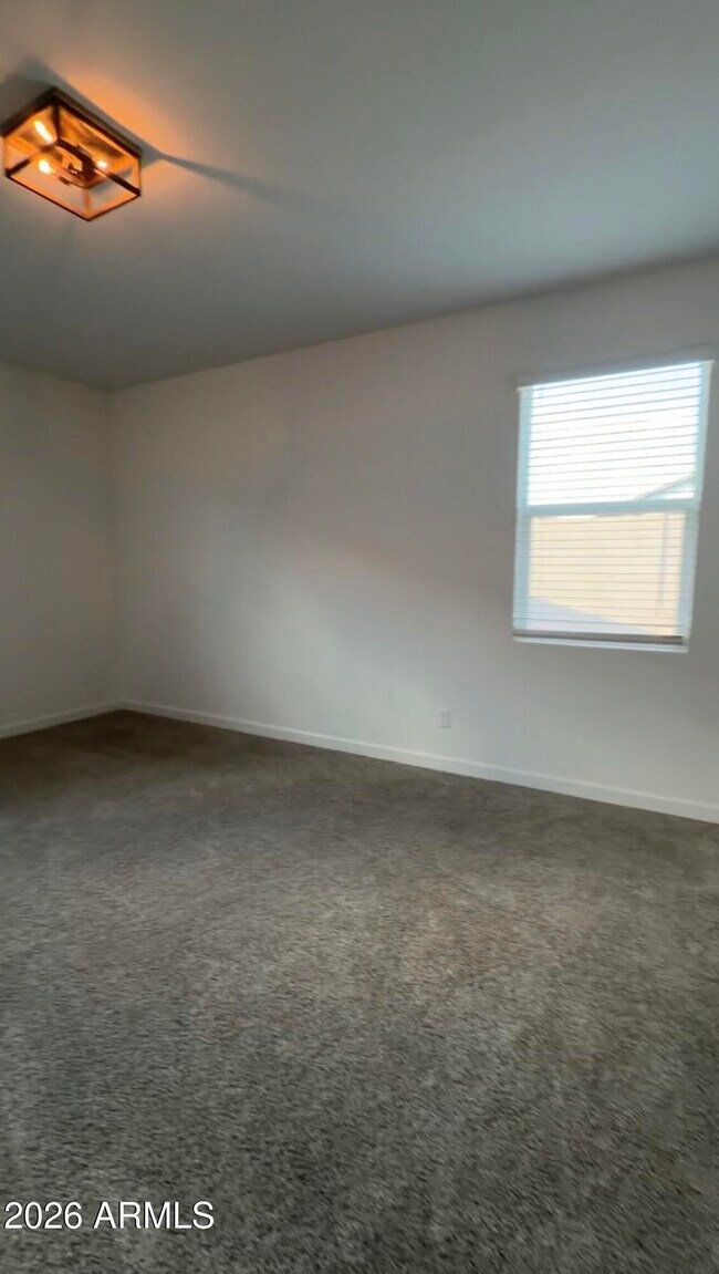 Building Photo - 24066 W Flores Dr