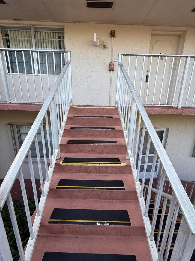 Building Photo - 12009 Poinciana Blvd