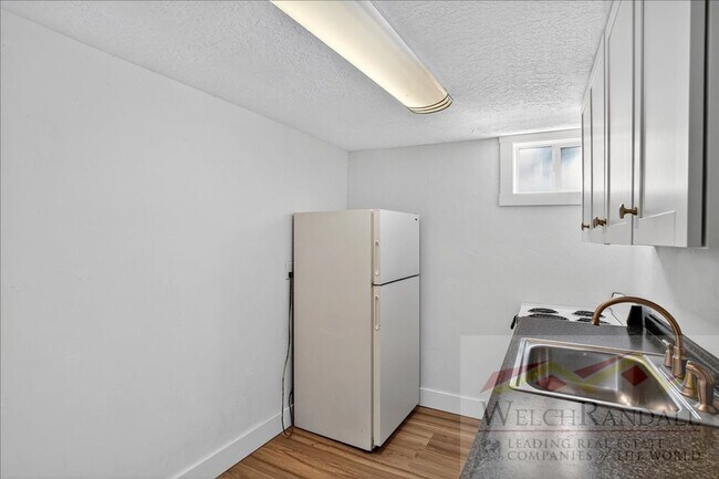 Building Photo - Javid Properties Triplex