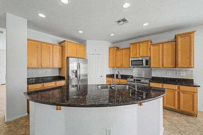 Building Photo - 6630 W Harwell Rd E