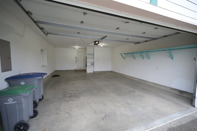 Building Photo - 2 bed + office, 2 bath, 2 car garage condo...