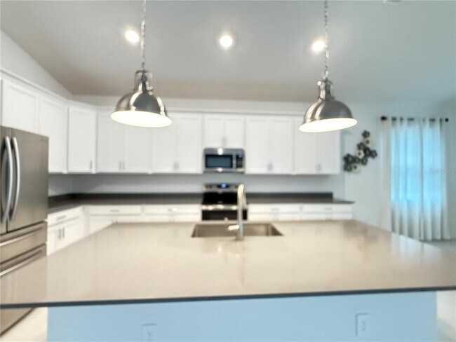 Building Photo - 7117 Dilly Lake Ave