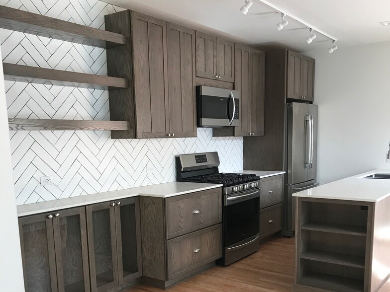 Kitchen with Custom Cabinets - 308 Arno St NE