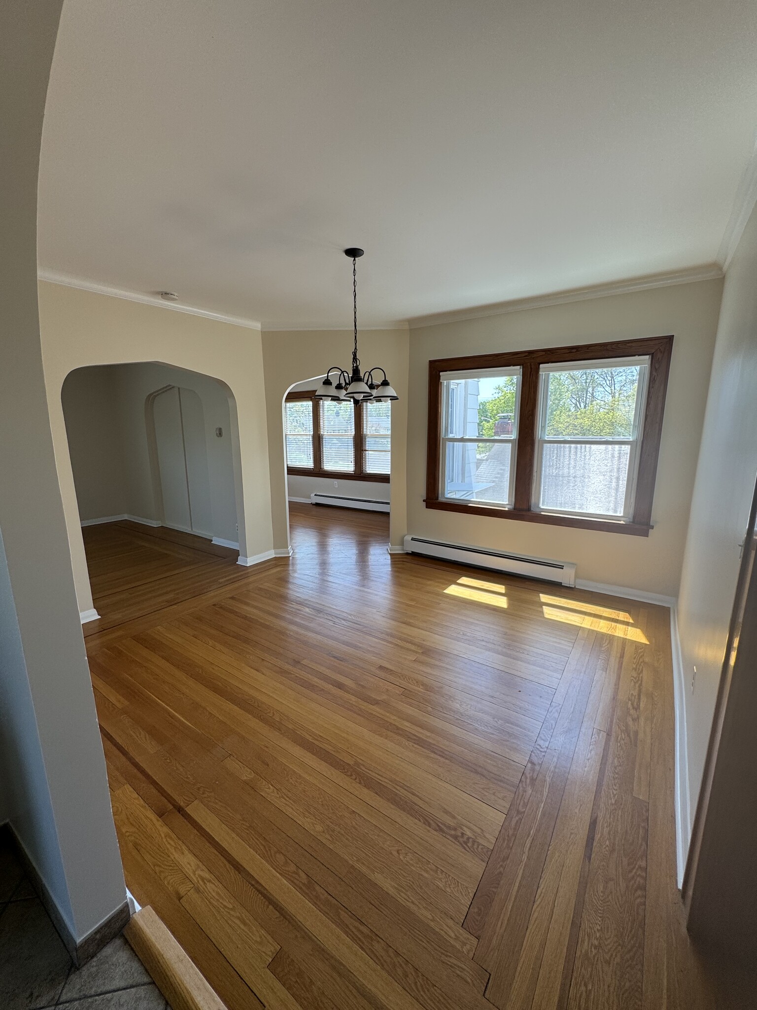 View from kitchen into dining room and sunroom - 510 Lincoln Ave