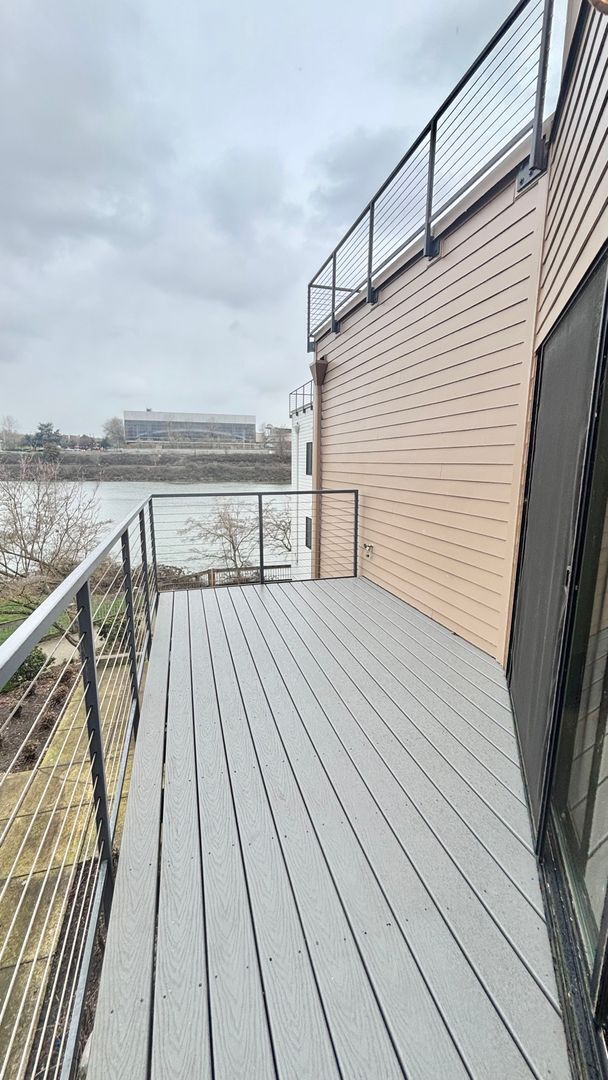 Building Photo - Spacious 2BR/2BA Condo – 1,086 SF + Parking + River Views | NW Portland