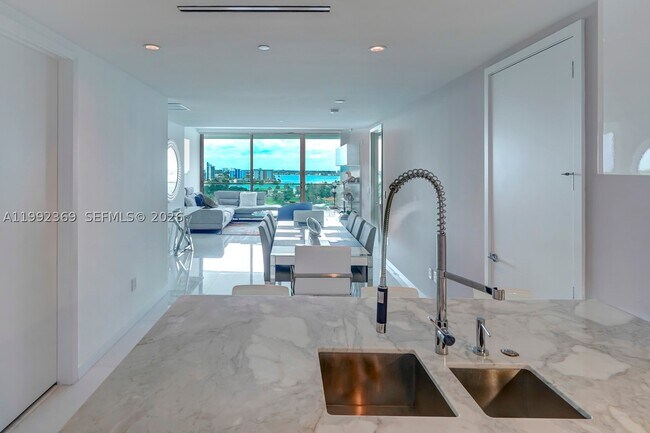 Building Photo - 10203 Collins Ave