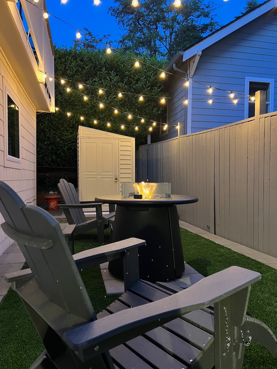 TIKI fire pit and Adirondack chairs - 525 NE 86th St