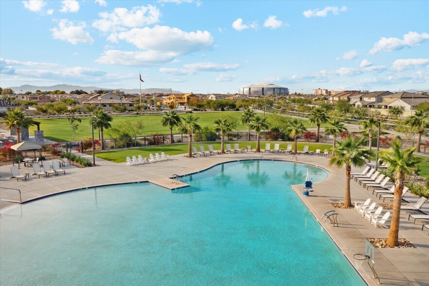 View of pool area showing proximity to State Farm Stadium in background - 8957 W Palo Verde Dr
