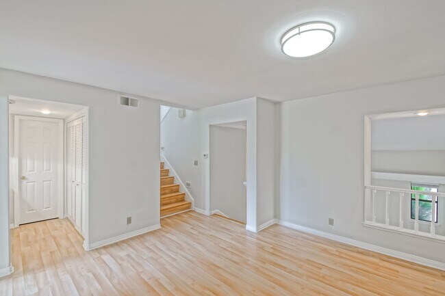 Building Photo - PRIME POOLFRONT LOCATION & CLOSE TO MAIN GATE! BRIGHT & SPACIOUS, END-UNIT POOLFRONT TOWNHOUSE W/...