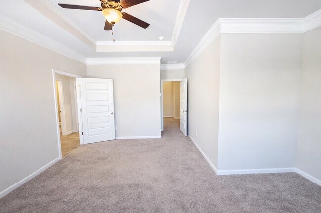 Building Photo - 3-bedroom Townhome in Buford City Schools with Quartz Kitchen, Private Suite, and Walkable Downto...